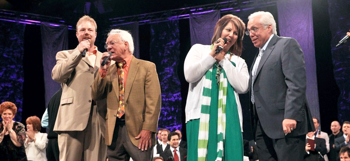 Ben Speer on stage with Daniel Riley, Becky Isaacs Bowman and Mark Trammell at Gaither Homecoming event